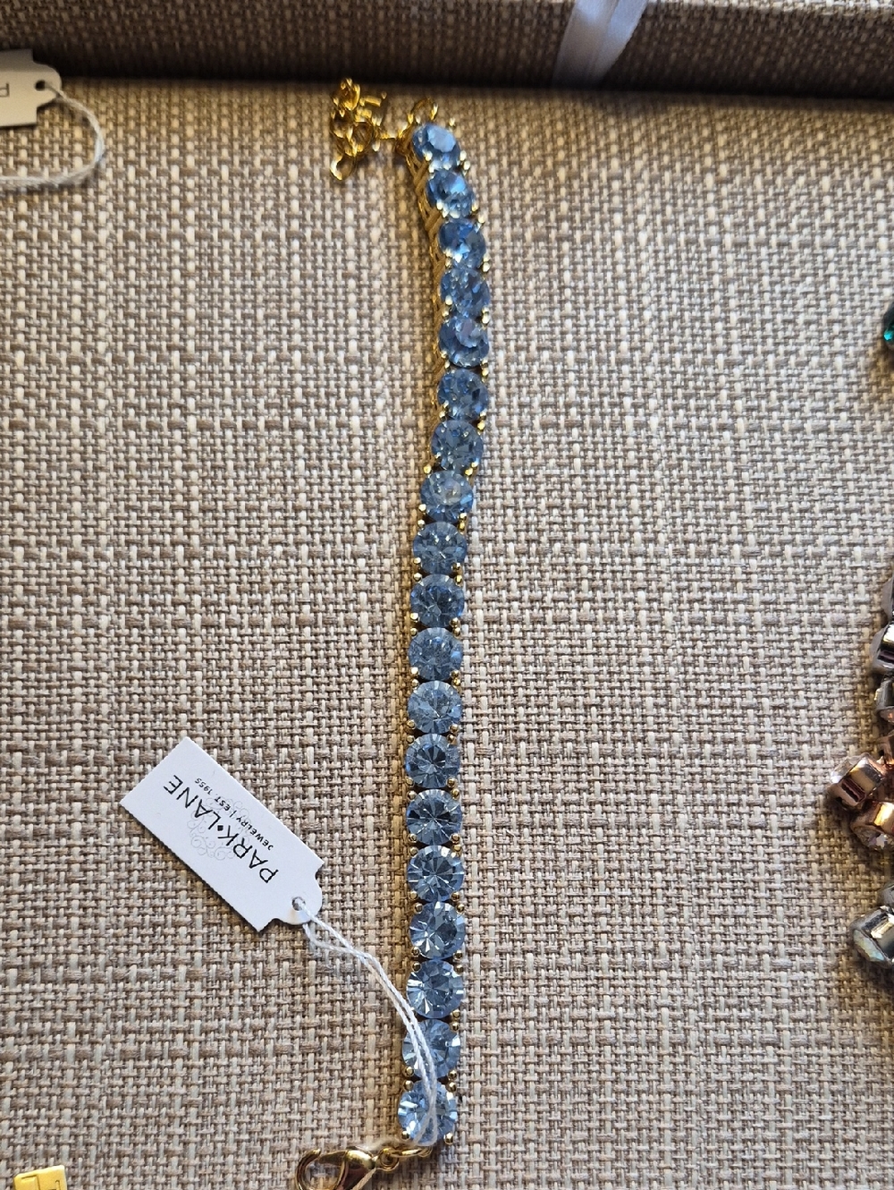 Park Lane Sky Blue Crystal Bracelet with Gold Tone Setting